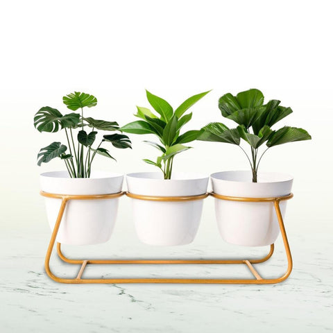 Modern three white metal pot with iron stand